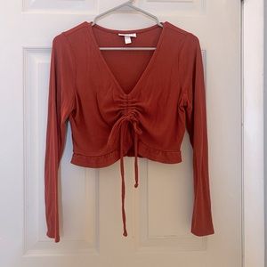 Long sleeve crop top.